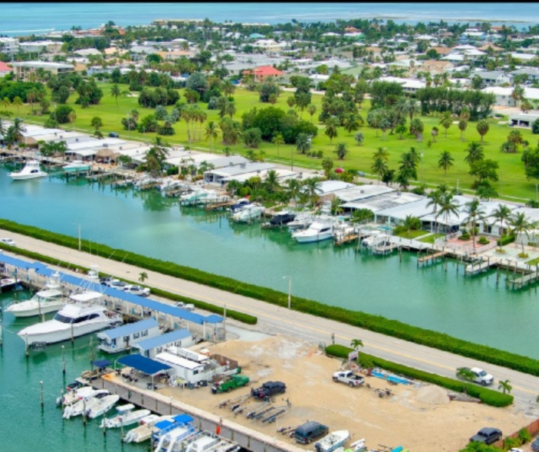 Boats docked at a marina in Key Colony Beach Florida