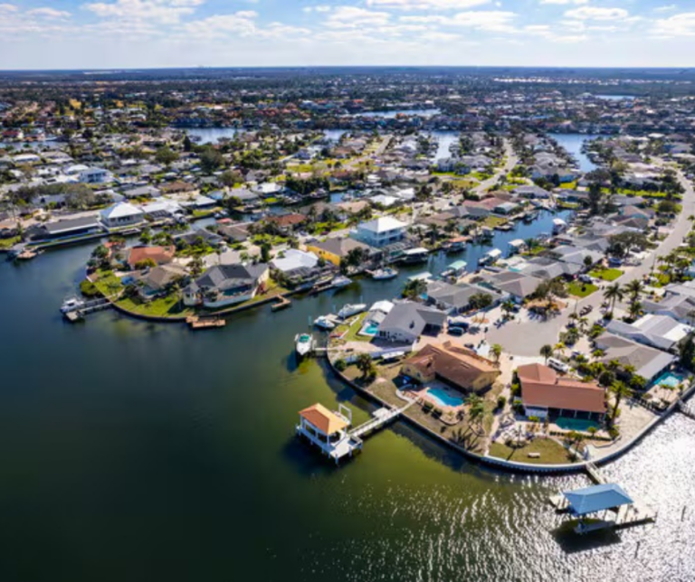Canal lined with boats in Apollo Beach neighborhood